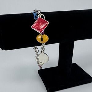 Vintage Avon Silver-Tone Charm Bracelet with Pink Enamel Logo and Yellow Bead
